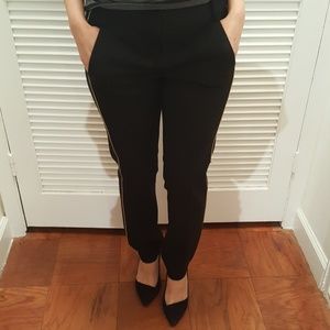 Black pants with gold strip